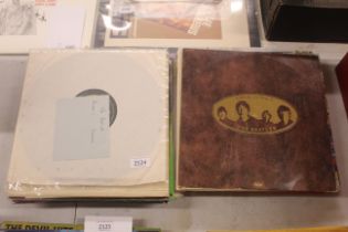 A collection of Beatles albums including The White