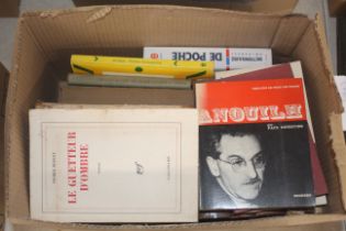 A box of miscellaneous French language books