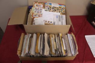 Two boxes of stamps and sorted world covers includi