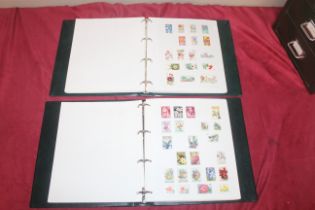 Two Thematic stamp albums of World stamps on flowe