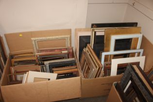 Two boxes of miscellaneous pictures frames i