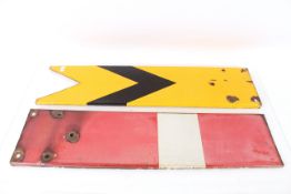 A yellow and white enamel chevron signal and a red