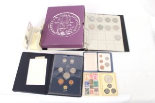 A collection of various British coins, including E