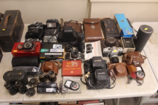 A large collection of various cameras and equipmen