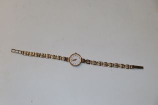 A W. H. W. 9ct gold cased wrist watch with 9ct gol