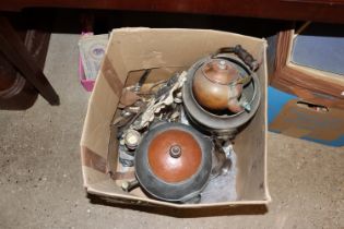 A box containing a tea urn and other various metal