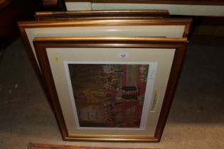 Three framed and glazed photographic prints depict
