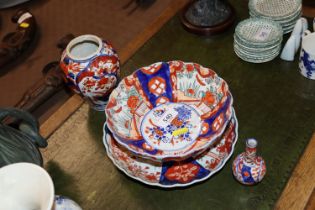 Four items of Imari pattern porcelain AF