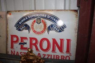 A reproduction tin Peroni advertising sign