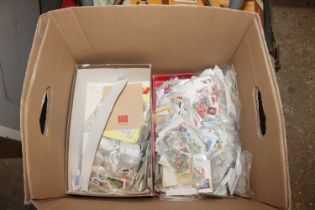 Two boxes of miscellaneous stamps, loose and in al