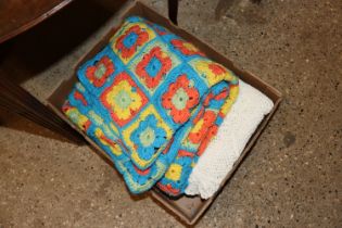 A box containing crochet and other blankets etc.