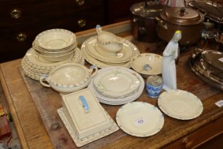 A quantity of Myott & Son dinnerware; a Lladro sty