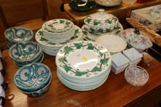 A quantity of Wedgwood "Napoleon Ivy" pattern dinnerware; a Continental pottery bowls etc.