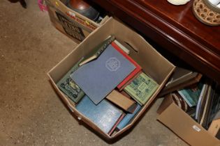 A box of various vintage books