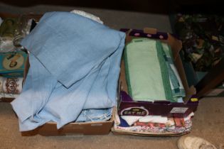 A box of various linens to include patchwork and a