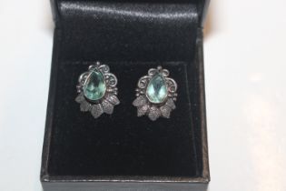 A pair of 925 silver ear-rings set with blue stone