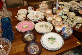 A quantity of Oriental decorated teaware; 19th Century and later plates; two oak framed Pratt ware