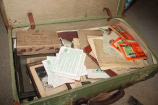 A vintage suitcase containing newspapers from 1940