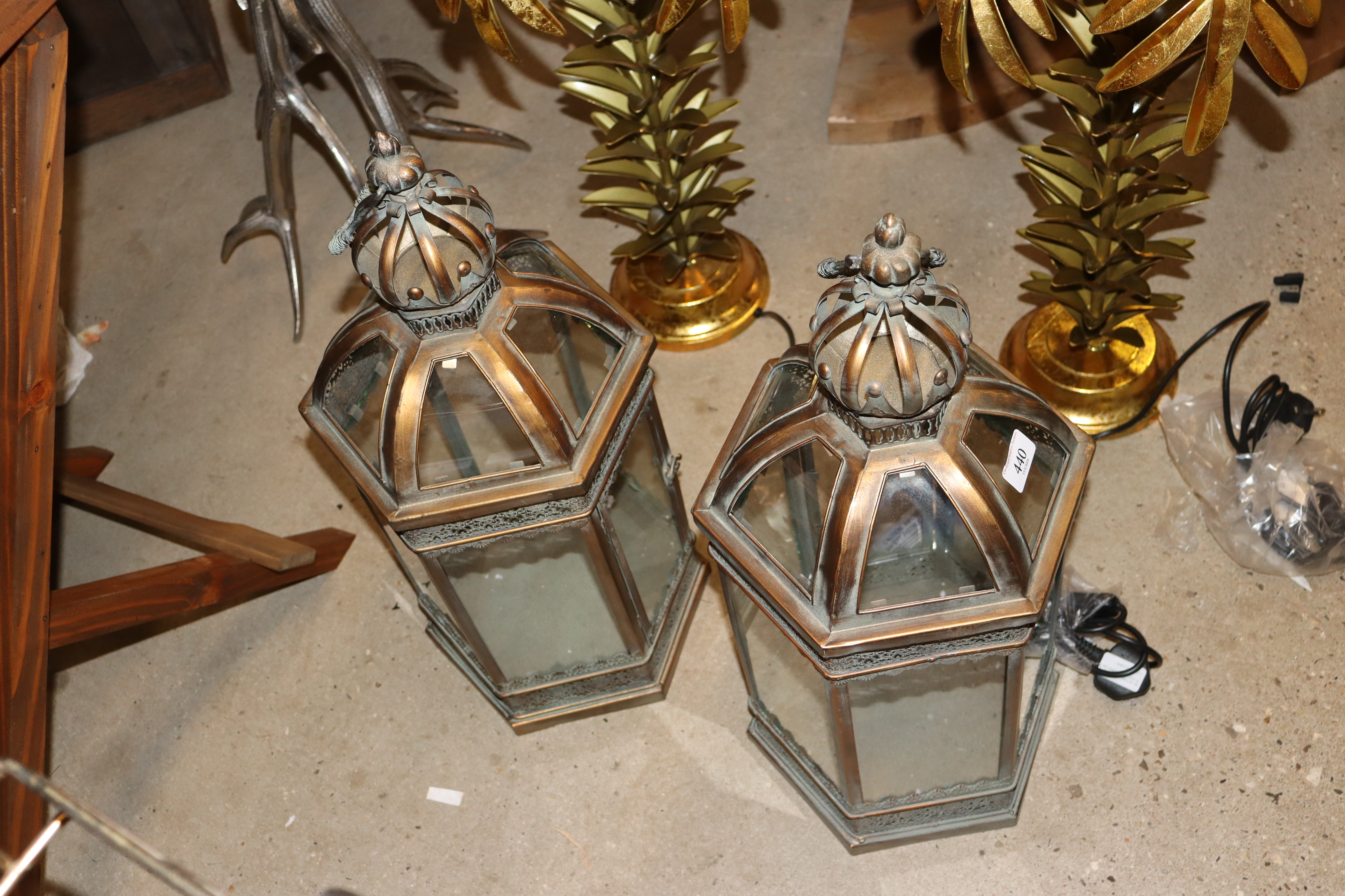 A pair of copper and glass lanterns
