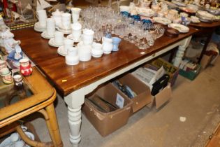 A part painted oak topped dining table fitted two