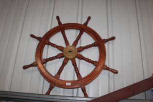 A wooden ship's wheel