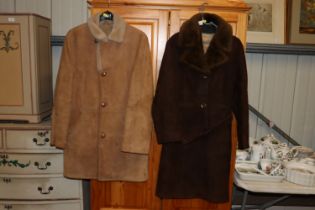 A man's sheepskin coat; and a ladies sheepskin coa