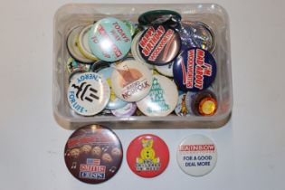 A collection of various badges