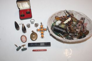 A basket containing various costume jewellery, cad