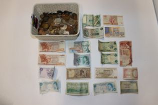 A basket containing various coinage and bank notes
