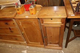 A stripped pine side cupboard together with a pine