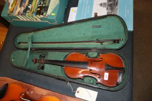 A Schweitzer ¾ size violin in fitted case with bow