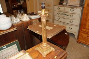 A Corinthian column table lamp