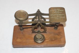 A set of postal scales and a collection of weights