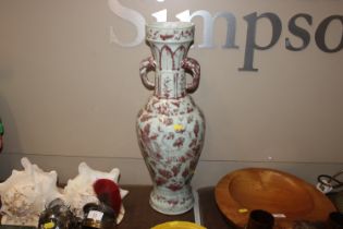 A large Chinese baluster vase with underglaze ochr