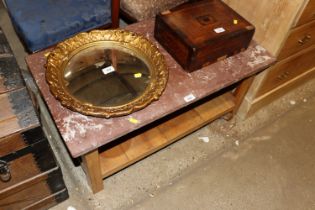 An oak and marble topped coffee table