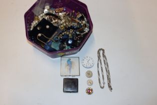 A box containing various costume jewellery and wri