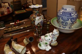 A Chinese decorated baluster vase; a pair of brass