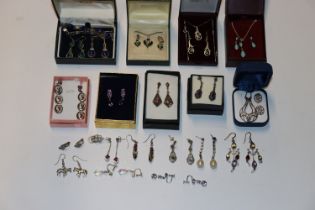 A box containing 925 silver and other necklaces wi