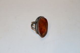 A large vintage silver and amber ring size N/O