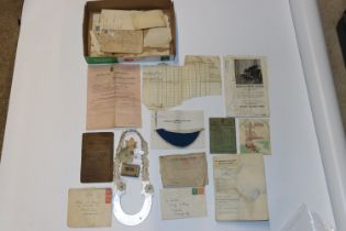 A box of assorted military ephemera, photos etc.