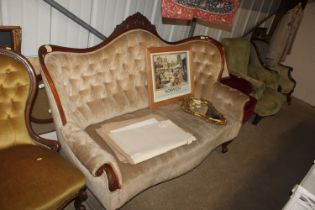 A Victorian button back upholstered sofa