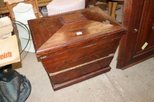 A 19th Century mahogany sarcophagus shaped wine co