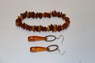 A pair of vintage amber drop ear-rings and a natur