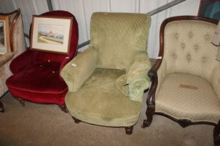 An upholstered deep seated armchair