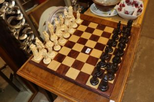 A chess board and pieces