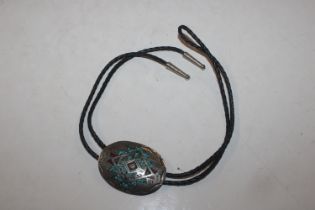 A Navajo Indian sterling silver, turquoise and cor