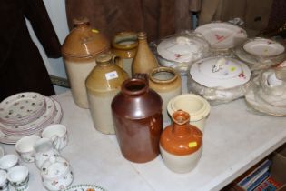 A quantity of stoneware jars, flagons and bottles