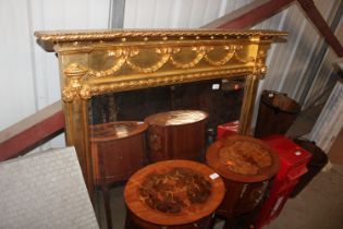 A gilt framed bevel edged overmantel mirror