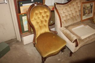 A Victorian upholstered spoon back nursing chair