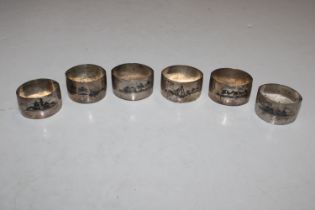 A set of six Iraqi silver and Niello decorated nap